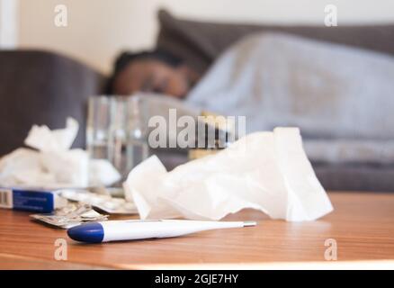A sleeping man in bed ill with the flu Photo: Isabell Hojman / TT / code 11711  Stock Photo