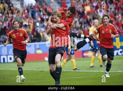 Spain's Fernando Torres is congratulated by teammates after his 1-0 goal in the Group D Euro 2008 soccer match between Sweden and Spain at the Tivoli Neu Stadium in Innsbruck. Stock Photo