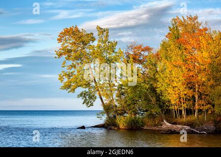 USA, Michigan, Silver City, Sunset where Big Iron River meets Lake Superior Stock Photo