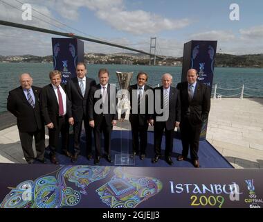 Turkish Football Federation President Mahmut Ozgener(4ndL), Michel Platini of France, President of UEFA and vice President of UEFA Senez Erzik (2ndR) pose with UEFA Cup trophy during a handover ceremony in Istanbul Turkey on Thursday, 23 April 2009. UEFA Cup Final will be held at Fenerbahce Sukru Saracoglu Stadium in Istanbul on 20 May 2009. Stock Photo