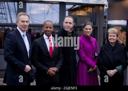 Photographer Mattias Klum, Britain's former Prime Minister Tony Blair, Managing director in the Swedish Postcode Lottery Niclas Kjellstrom-Matseke and Sweden's Crown Princess Victoria at the photo exhibition 'The Testament of Tebaran' in connection with a seminar 'Fighting Deforestation', which was held at the Admiral Hotel in Nyhavn, Copenhagen Stock Photo