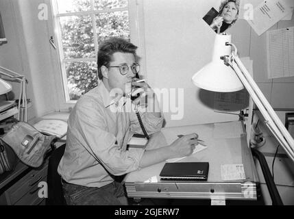 Swedish crime writer Stieg Larsson is seen at work as a news graphic illustrator at the TT Feature and Photo desk in Stockholm, Sweden. Stock Photo