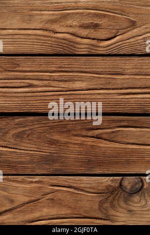 close up of brown wooden wall made of four planks Stock Photo