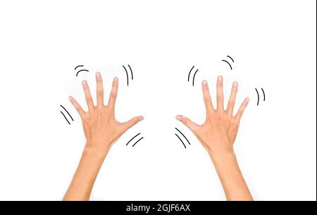 Shaking hands or essential tremor in Asian young man. Isolated on white. Stock Photo