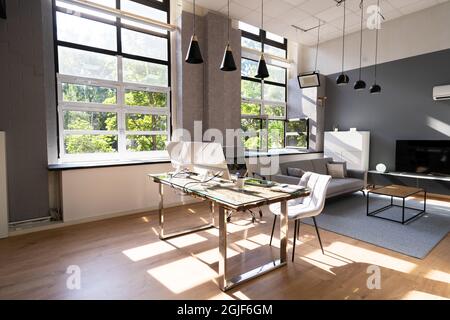 Work From Home Desk With Desktop Computer In Modern Home Stock Photo