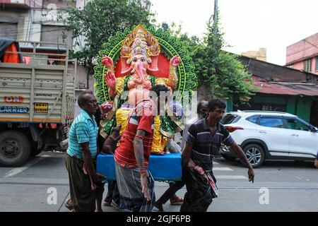 Kolkata, India. 09th Sep, 2021. The home coming of Lord Ganesha is happening today at Kumortuli in Kolkata. This year Ganesh Chaturthi 2021 will be celebrated on Friday, 10 September 2021. Ganesh Chaturdashi, also called as Vinayak Chaturdashi, is an important Hindu festival. Ganesh Chaturdashi marks the birth anniversary of Lord Ganesha who is the son of Lord Shiva, and Goddess Parvati. Lord Ganesh is the symbol of education, wisdom, good fortune and prosperity. (Photo by Snehasish Bodhak/Pacific Press) Credit: Pacific Press Media Production Corp./Alamy Live News Stock Photo