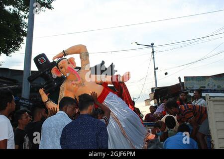 Kolkata, India. 09th Sep, 2021. The home coming of Lord Ganesha is happening today at Kumortuli in Kolkata. This year Ganesh Chaturthi 2021 will be celebrated on Friday, 10 September 2021. Ganesh Chaturdashi, also called as Vinayak Chaturdashi, is an important Hindu festival. Ganesh Chaturdashi marks the birth anniversary of Lord Ganesha who is the son of Lord Shiva, and Goddess Parvati. Lord Ganesh is the symbol of education, wisdom, good fortune and prosperity. (Photo by Snehasish Bodhak/Pacific Press) Credit: Pacific Press Media Production Corp./Alamy Live News Stock Photo