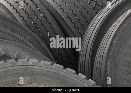 Tread pattern in stack of old used tires, Palouse agricultural region of Eastern Washington State. Stock Photo