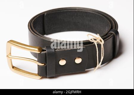 Round shape black leather belt isolated on white studio background Stock Photo