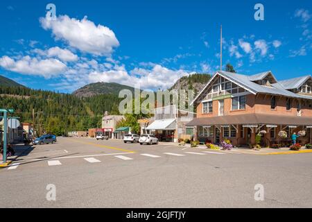 The main street shops and businesses of the rural town of Metaline Falls in Pend Oreille county near the USA and Canadian border at summer. Stock Photo