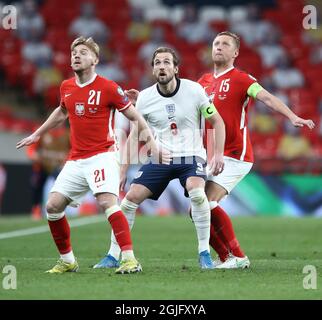 Kamil Jozwiak of Poland ,Harry Kane  of England and Kamil Glik of Poland during England v Poland football match Stock Photo