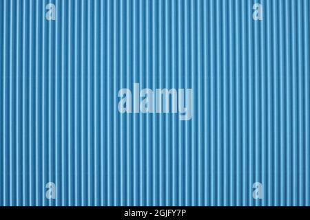 Closeup of blue striped perforated paper background Stock Photo