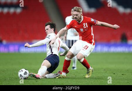 Kamil Jozwiak of Poland and Ben Chilwell of England during England v Poland football match Stock Photo