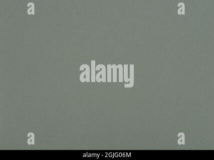 Sage green paper background. Medium grey colour paper texture. Stock Photo