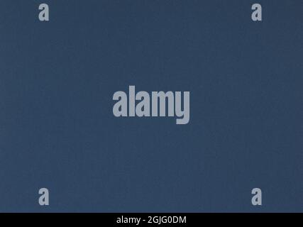 Dark grey blue paper background. Pickled bluewood colour paper texture. Stock Photo