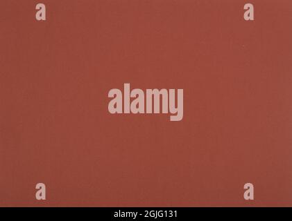 Orangy red paper background. Copper clay colour paper texture. Stock Photo