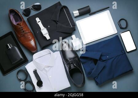 Top view of male accessories and gadgets on the wooden table Stock Photo -  Alamy