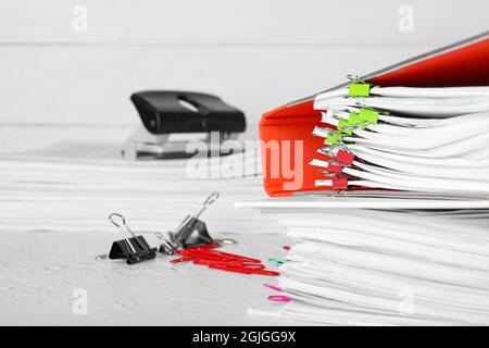 Stack of folders with documents on table Stock Photo