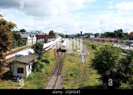 Berlin, Germany, August 29, 2021, View from the Warschauer bridge in the direction of Ostkreuz station with tracks and old water tower in the backgrou