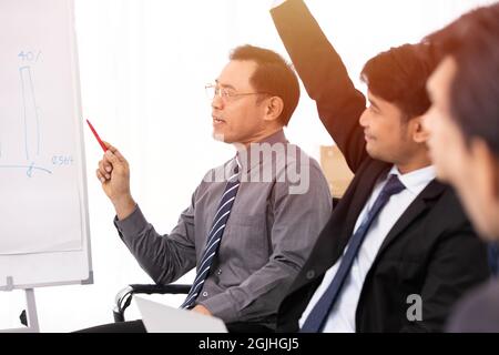 Business team leader meeting working group perform active present working with class action. Stock Photo