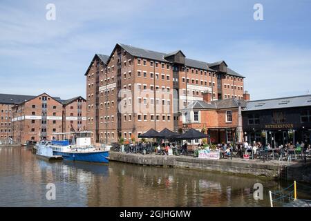 People drinking at the Wetherspoon pub at Gloucester Quays in the UK Stock Photo