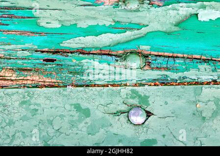 old green painted wood panels some old nails Stock Photo