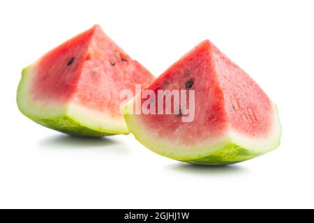 Red sliced watermelon. Pieces of red melon isolated on white background. Stock Photo