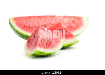 Red sliced watermelon. Pieces of red melon isolated on white background. Stock Photo
