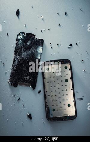 Smashed mobile phone. Stock Photo