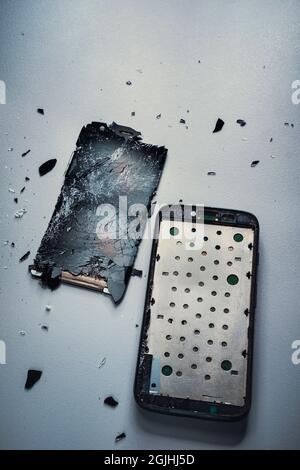 Smashed mobile phone. Stock Photo