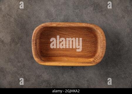 Oval brown empty natural wooden bowl Stock Photo