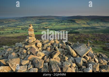 Rocks stacked on top of a cairn, on the summit of Beamsley Beacon, a hill in Wharfedale, Yorkshire Dales National Park, UK Stock Photo