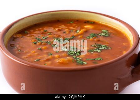 Red lentil soup in bowl isolated on white background Stock Photo