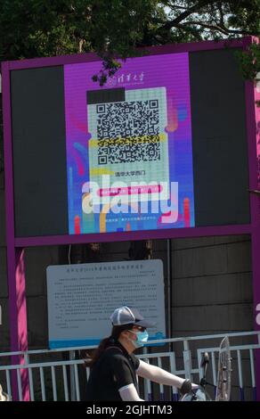 "Tsinghua Zijing" QR Code is seen at the school gate of Tsinghua University in Beijing, China. 10-Sep-2021 Stock Photo