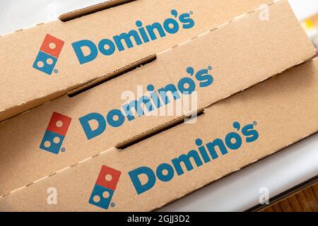 Antalya, Turkey - September 10, 2021: Domino's Pizza logo detail on a recycled pizza box. Stock Photo