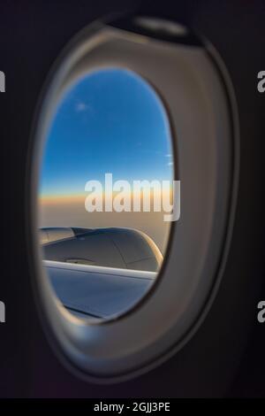 Sunrise view from window airplane Stock Photo