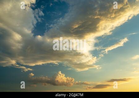 Fantastic clouds highlighted by the sun, spring view Stock Photo