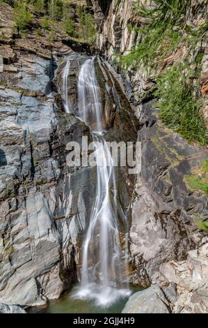 The upper level of the famous Lillaz waterfalls near Cogne, Aosta Valley, Italy, in the summer season Stock Photo