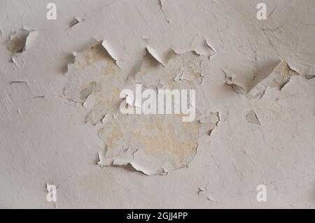 White empty grungy old vintage damaged background wall surface with peeling off Whitewash texture Stock Photo