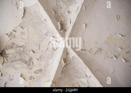 White empty grungy old vintage damaged background wall surface with peeling off Whitewash texture Stock Photo