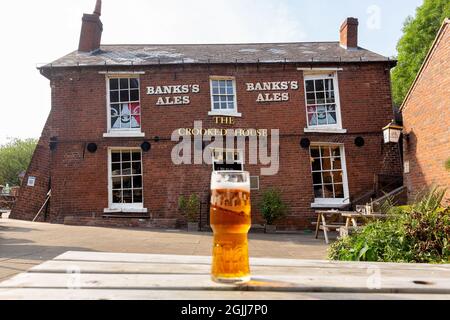 The UK’s quirkiest pub The Crooked House in Himley, Dudley which opened in 1830. the pub is tilted by approx 4 feet on one side to the other due to th Stock Photo