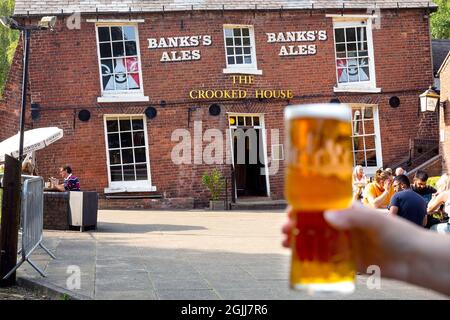 The UK’s quirkiest pub The Crooked House in Himley, Dudley which opened in 1830. the pub is tilted by approx 4 feet on one side to the other due to th Stock Photo