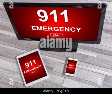 Emergency concept shown on different information technology devices Stock Photo