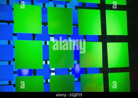 Abstract conceptual background with different green and blue squares, modern cover design. Background and texture of square geometric shapes Stock Photo