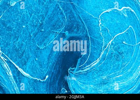 Swirled Blue Paint that is Mixing Stock Photo