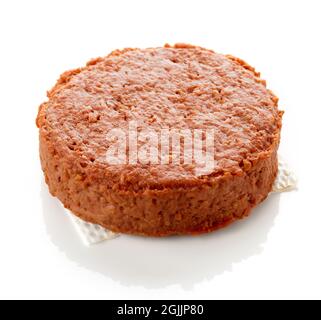 Plant based burger patty with grill marks isolated on white background Stock Photo