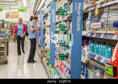 Miami Florida,Walgreens pharmacy drugstore,interior inside store display sale shelf shelves OTC,medicine heartburn woman female stock clerk working