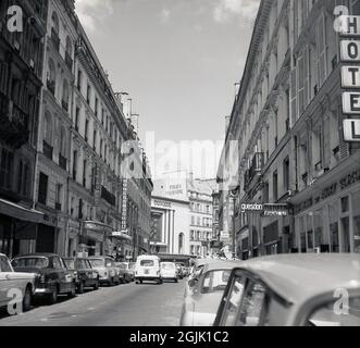 1960s, historical, view down the Parisian street  of Rue Richer to the building housing the famous cabaret music hall Folies Bergere, Paris, France. Stock Photo