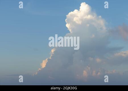 Beautiful colored cloudy evening sky. Sky with clouds at sunset. Abstract sky background. Stock Photo