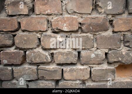 Old brick wall outdoor construction exterior pattern texture Stock Photo